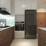 Kitchen with a built-in oven, stainless steel fridge and timber cabinets