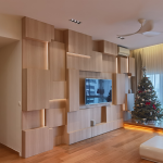 Timber-panelled TV feature wall with recessed lighting