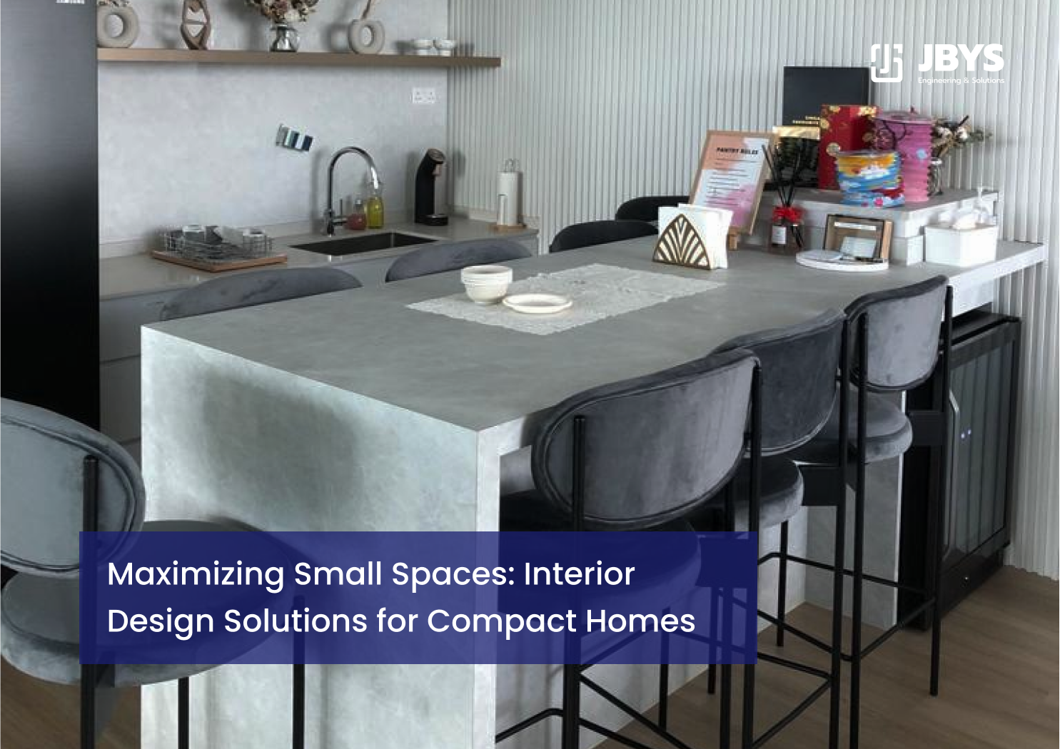 Modern kitchen and dining counter with dark gray barstools in a compact home.